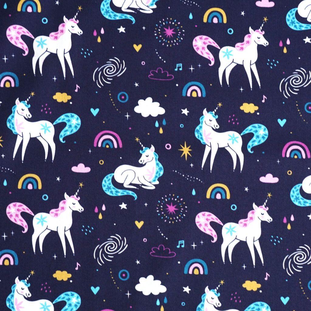 Baumwollstoff Motivdruck Einhorn Regenbogen dunkelblau rosa